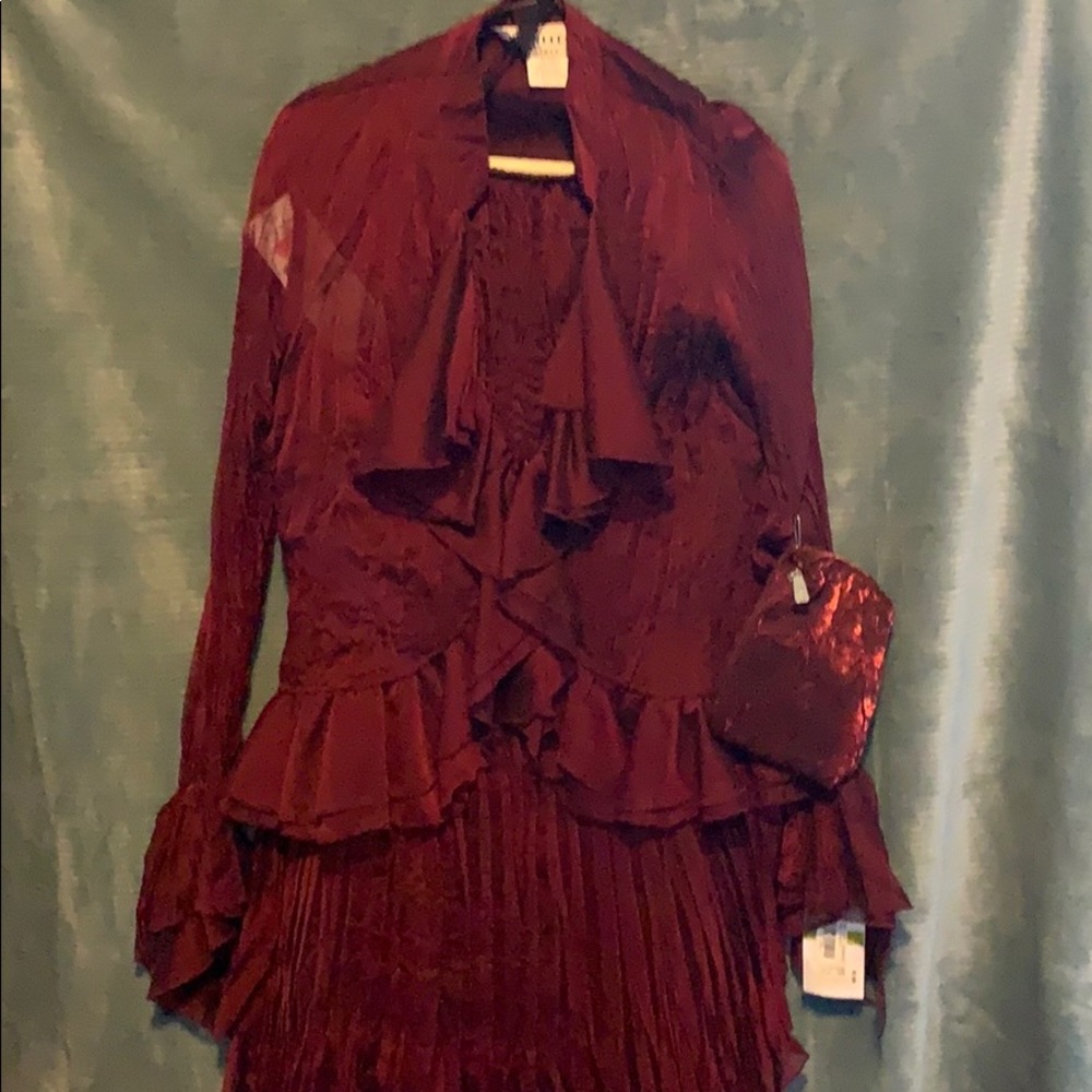 Skirt and blouse with small purse.